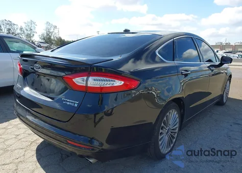 2014 Ford Fusion Hybrid Titanium z USA, uszkodzony, nr VIN 3FA6P0RU2ER378717
